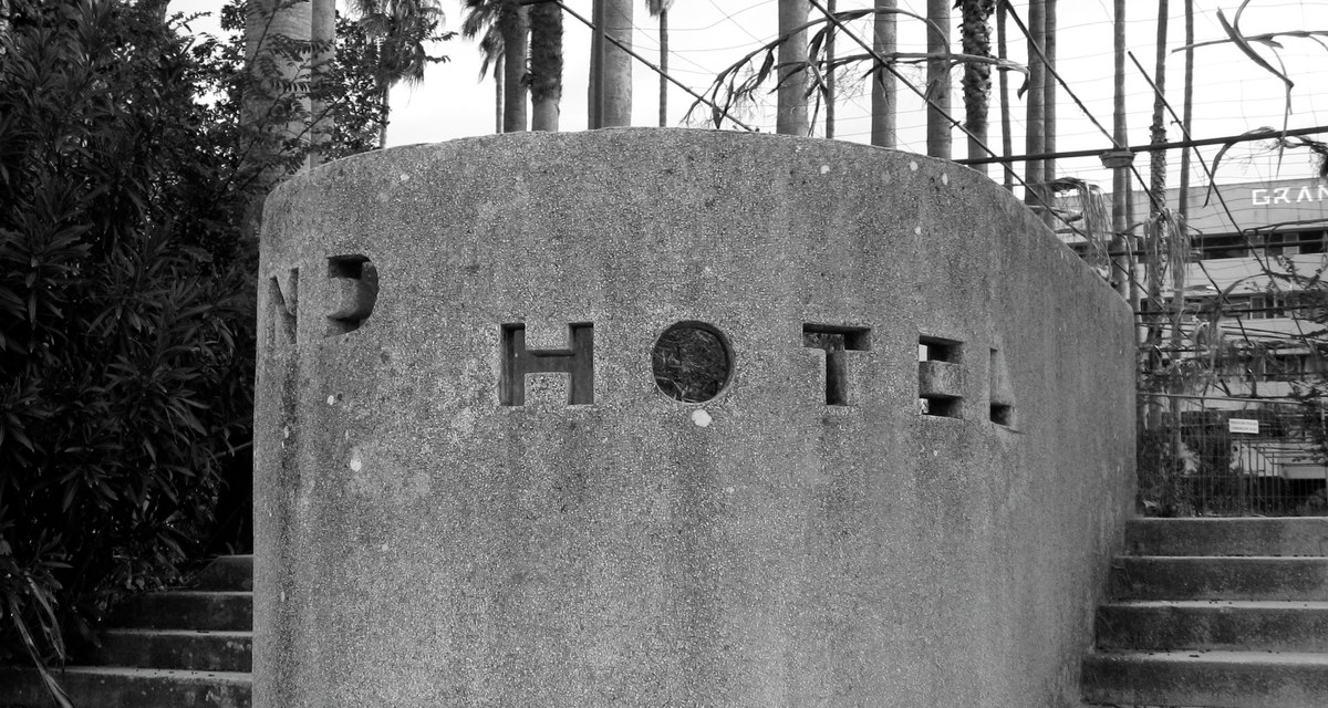 "HOTEL" stenciled into concrete